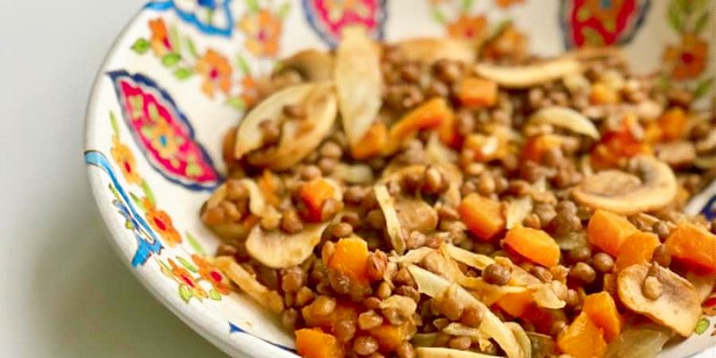 Linzen met pompoen en champignons